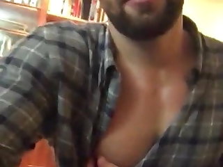 sexy guy playing with his nipple