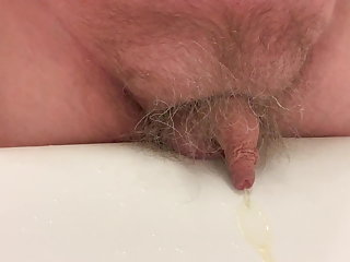My good friend Don's lovely little uncut willy pees close-up