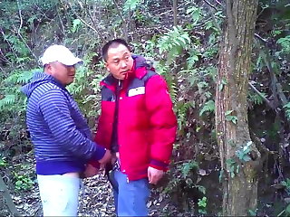 Asian bear daddies getting it on in the woods